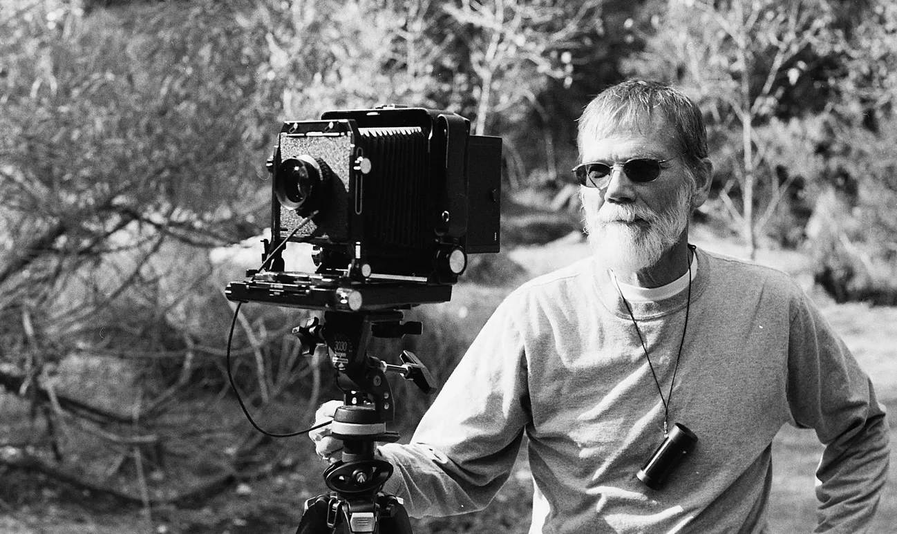 A man using a large format view camera.